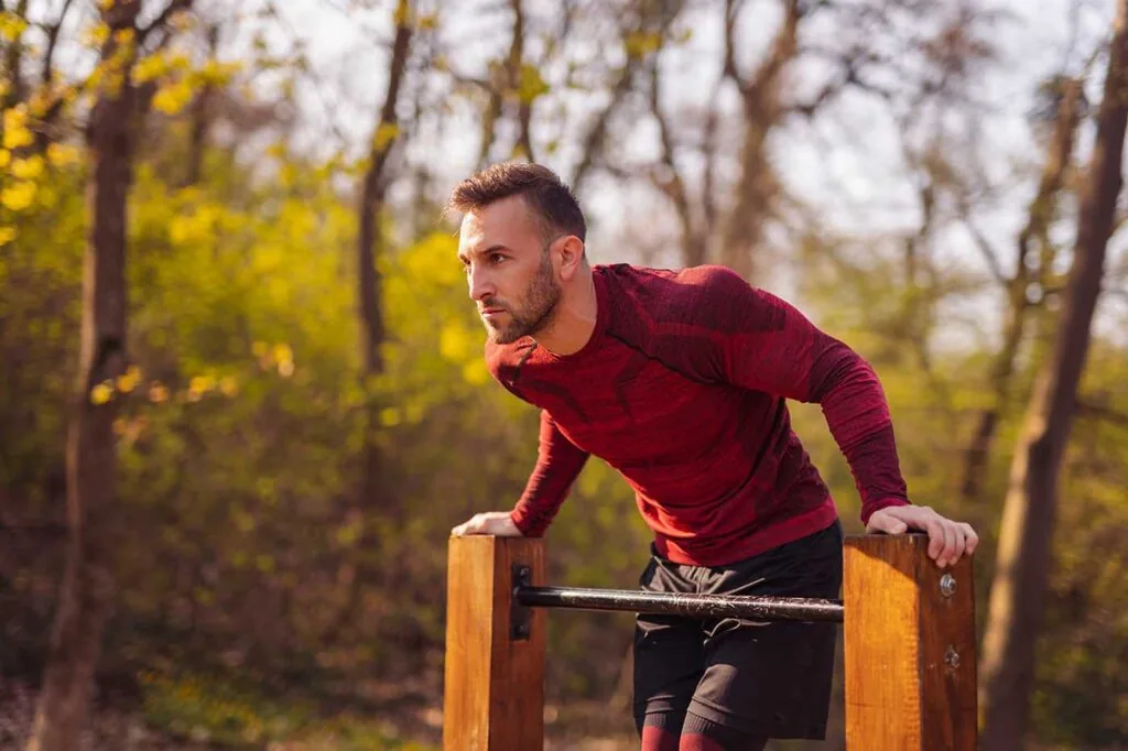 man cool down after work out in street